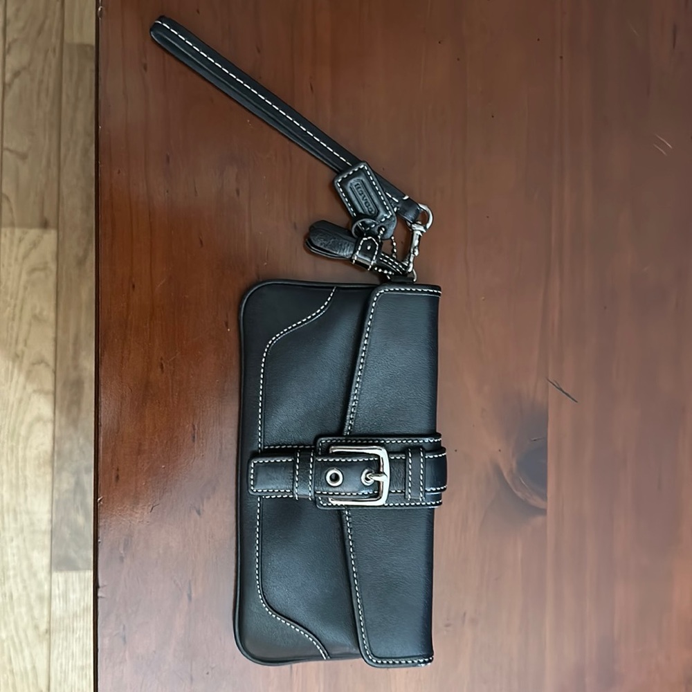 Good condition, leather Coach Wristlet.